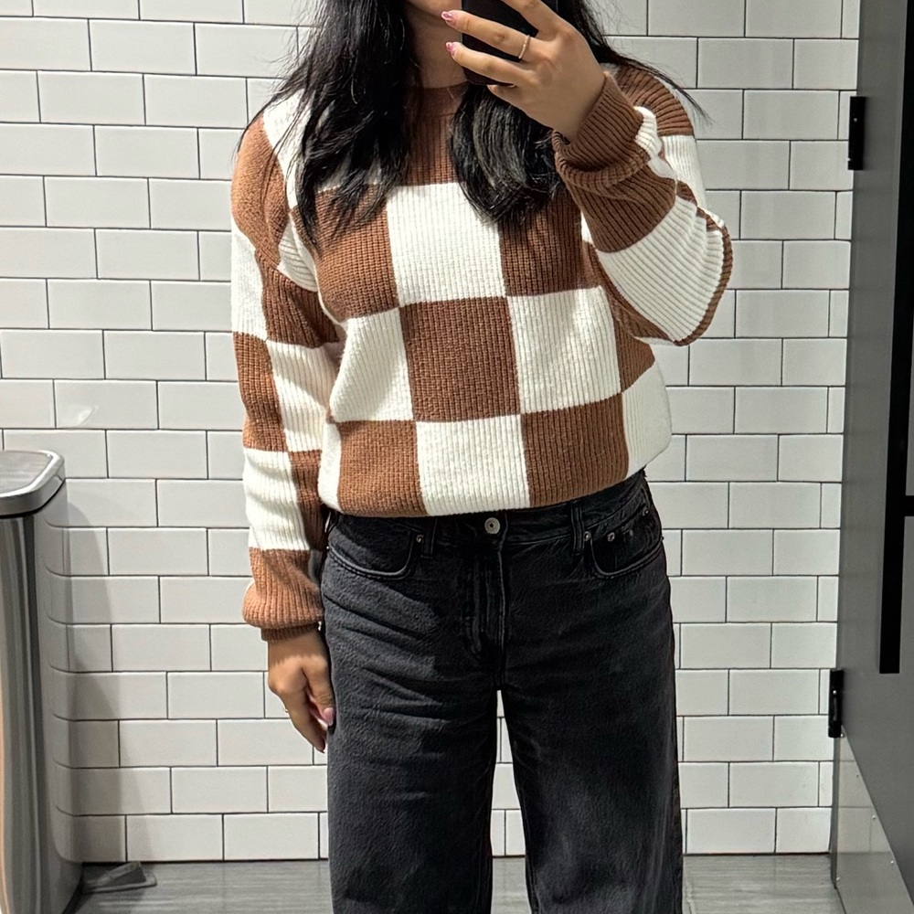 brown and white checkered sweater